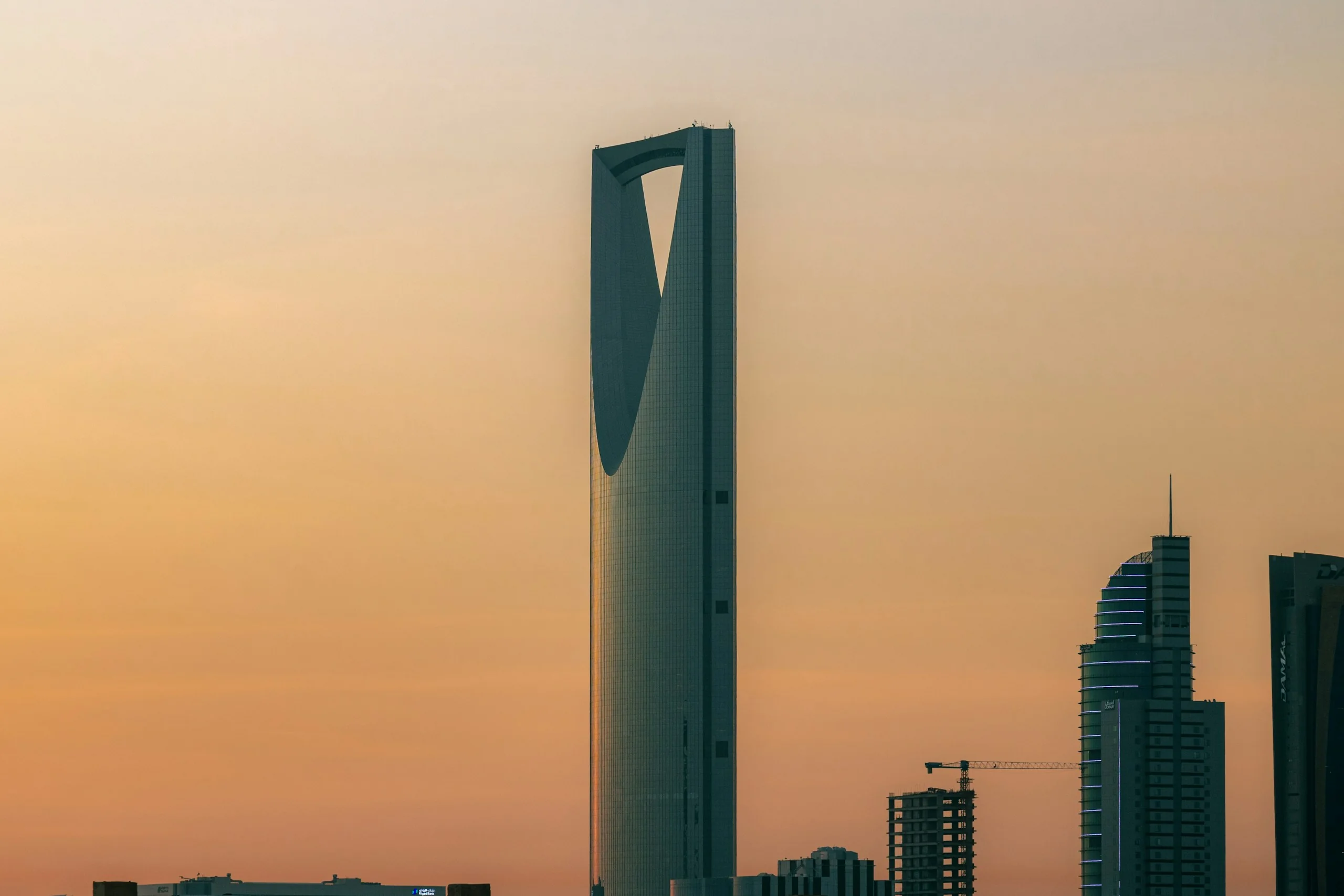 Kingdom Centre tower in Riyadh against a warm evening sky